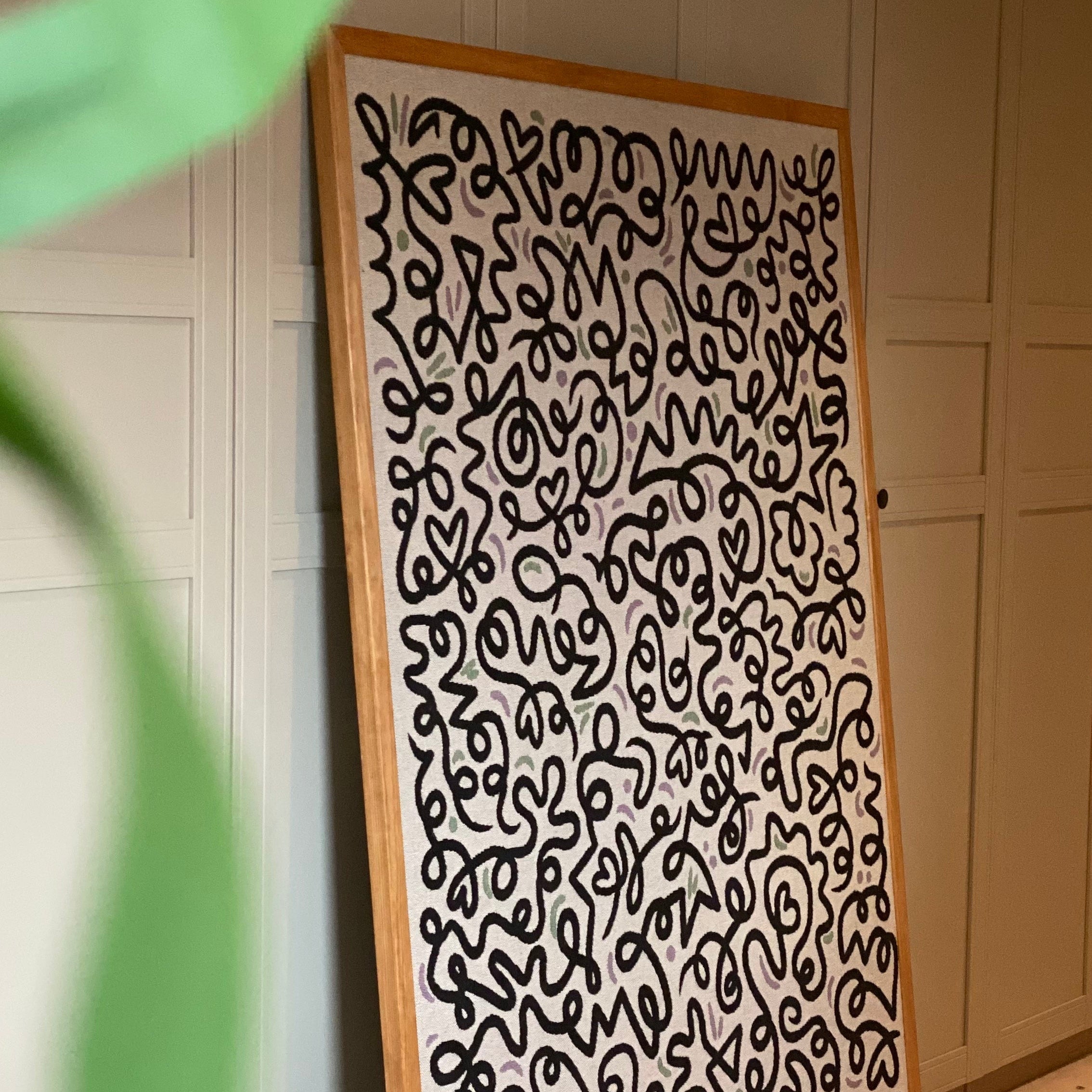 SORT SNIRKEL veggteppe